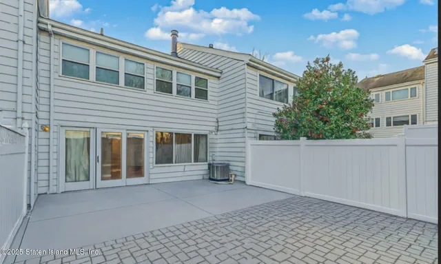 a front view of a house with yard