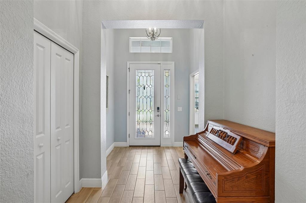 10339 Addison Shore Way Oxford, FL 34484 - Photo 25 of 54 a view of an entryway with furniture