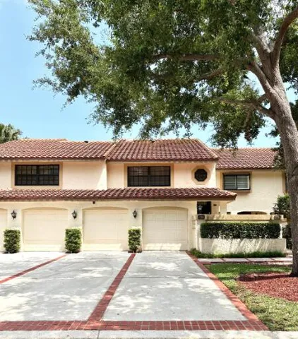 a front view of a house with a porch