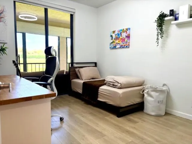 a view of a golf course with a lake