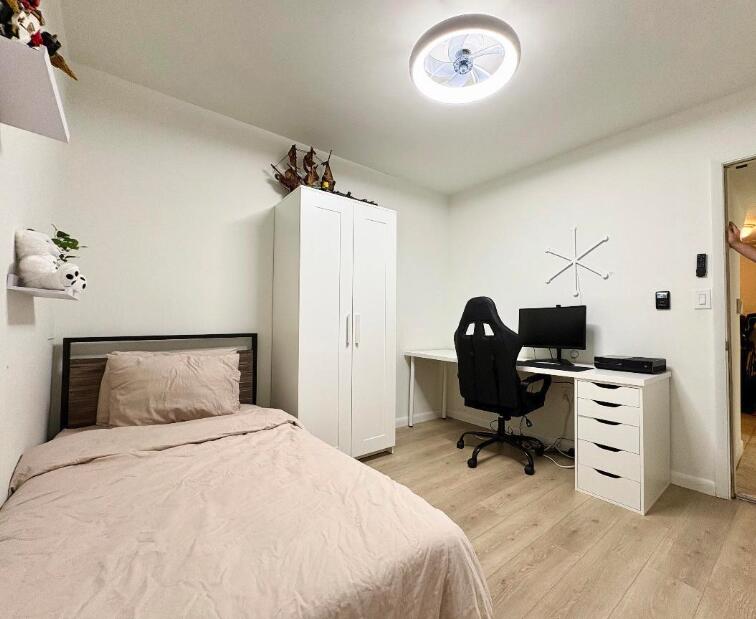 7744 La Mirada Drive Boca Raton, FL 33433 - Photo 23 of 33 a bedroom with a workspace