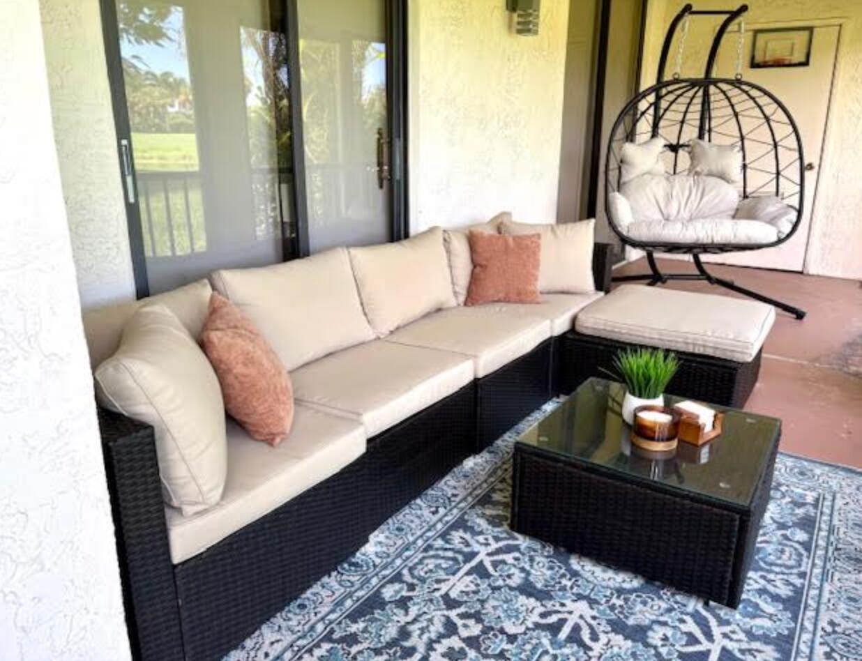 7744 La Mirada Drive Boca Raton, FL 33433 - Photo 25 of 33 a living room with furniture and a potted plant