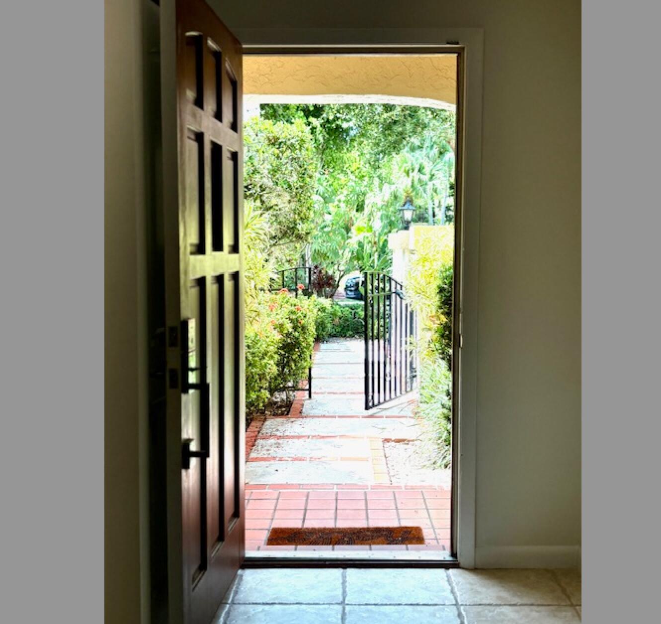 7744 La Mirada Drive Boca Raton, FL 33433 - Photo 5 of 33 a view of a porch