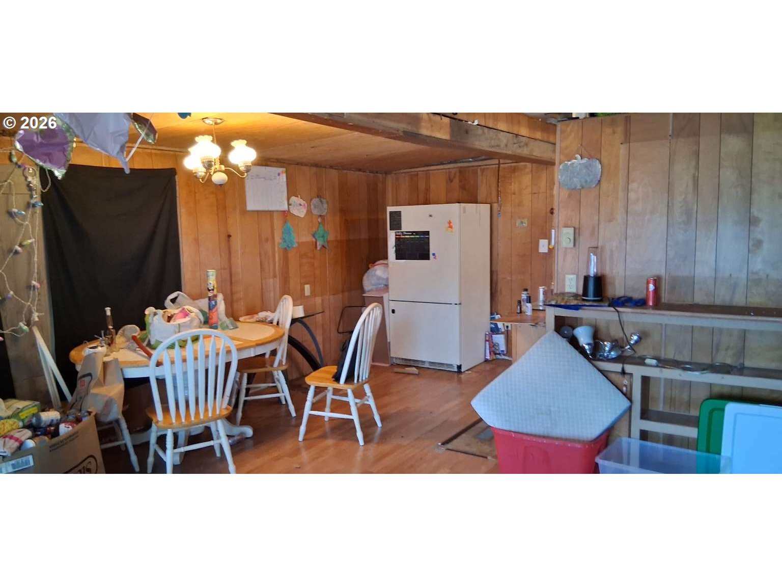 1413 Hawthorne Avenue, Unit 49 Reedsport, OR 97467 - Photo 10 of 10 a balcony with table and chairs