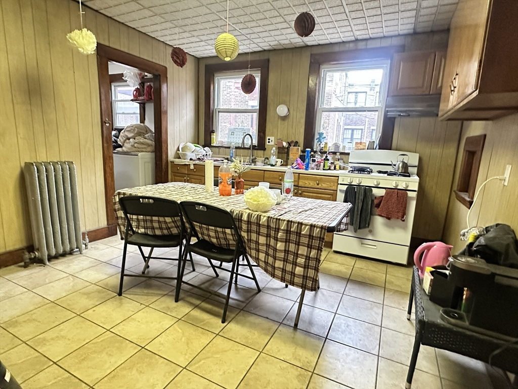 11 Chester Street, Unit 2 Boston, MA 02134 - Photo 2 of 10 a view of a dining room with furniture