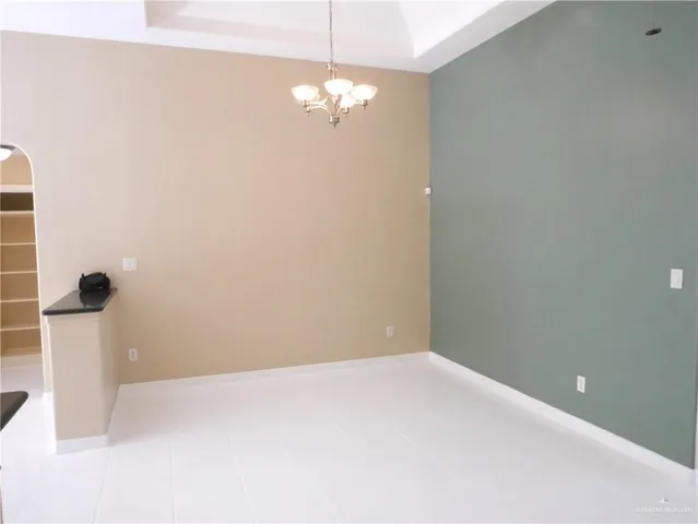 a view of a room with a hallway