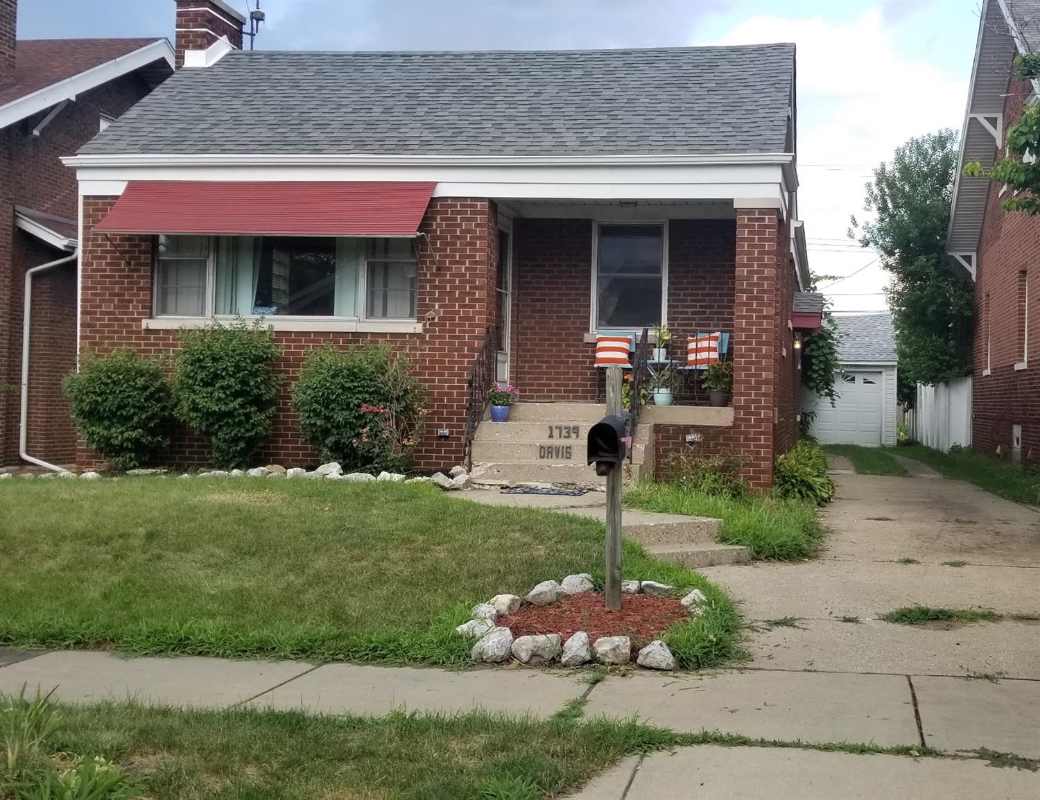 1739 Davis Avenue Whiting, IN 46394 - Photo 2 of 10 a front view of a house with garden