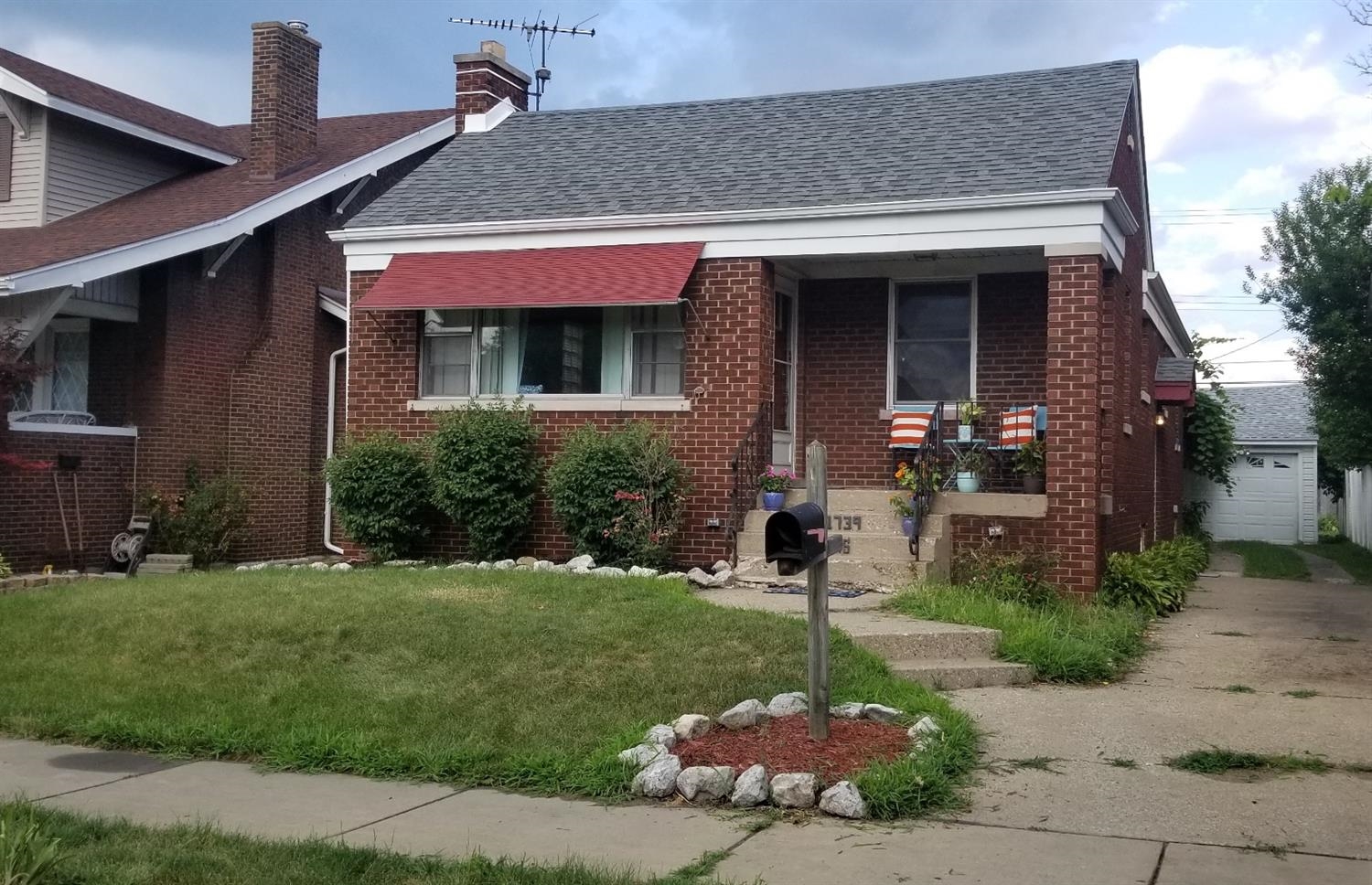 1739 Davis Avenue Whiting, IN 46394 - Photo 4 of 10 a front view of a house with a yard