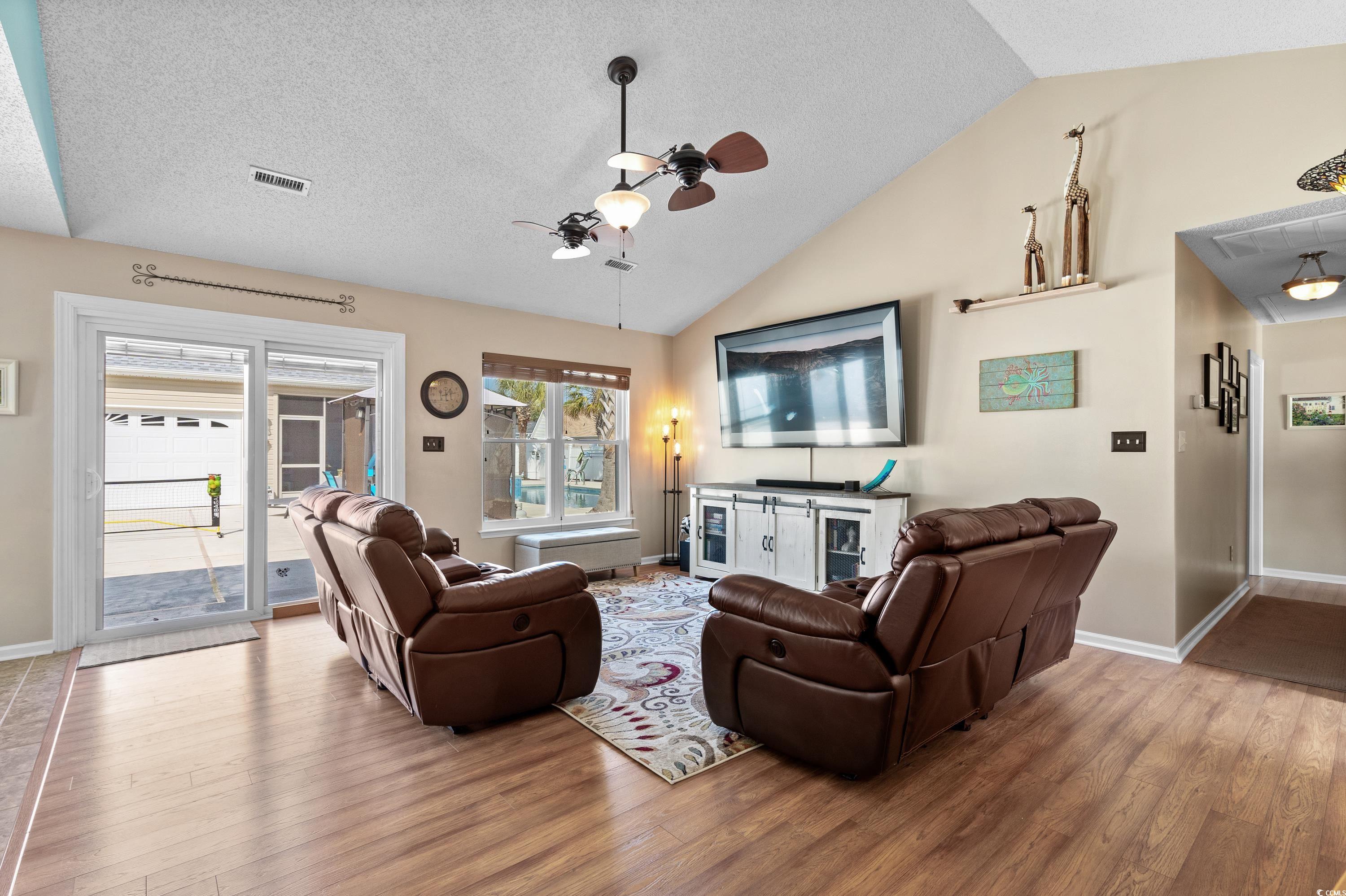 2621 Corn Pile Road Myrtle Beach, SC 29588 - Photo 10 of 40 Living room featuring ceiling fan, wood-type floor