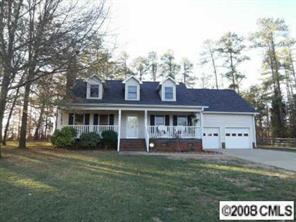 2425 Cherry Lane Denver, NC 28037 - Photo 8 of 8 a front view of a house with a yard