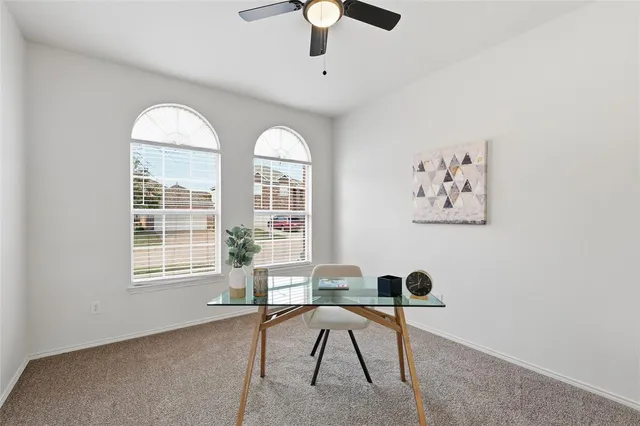 a workspace with furniture window and outside view