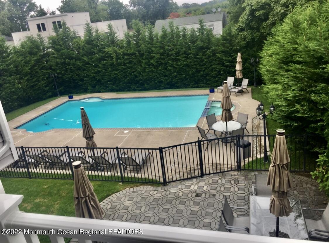 229 Lockwood Avenue Long Branch, NJ 07740 - Photo 11 of 24 a view of a backyard with a garden