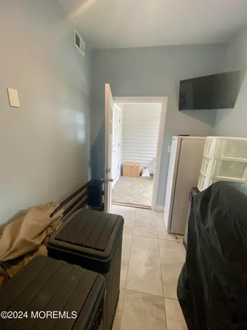 a view of bedroom with a bed