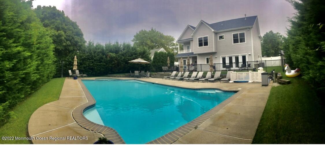229 Lockwood Avenue Long Branch, NJ 07740 - Photo 23 of 24 a view of a house with swimming pool and sitting area