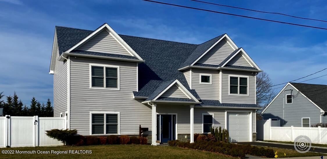 229 Lockwood Avenue Long Branch, NJ 07740 - Photo 24 of 24 a front view of a house with a yard