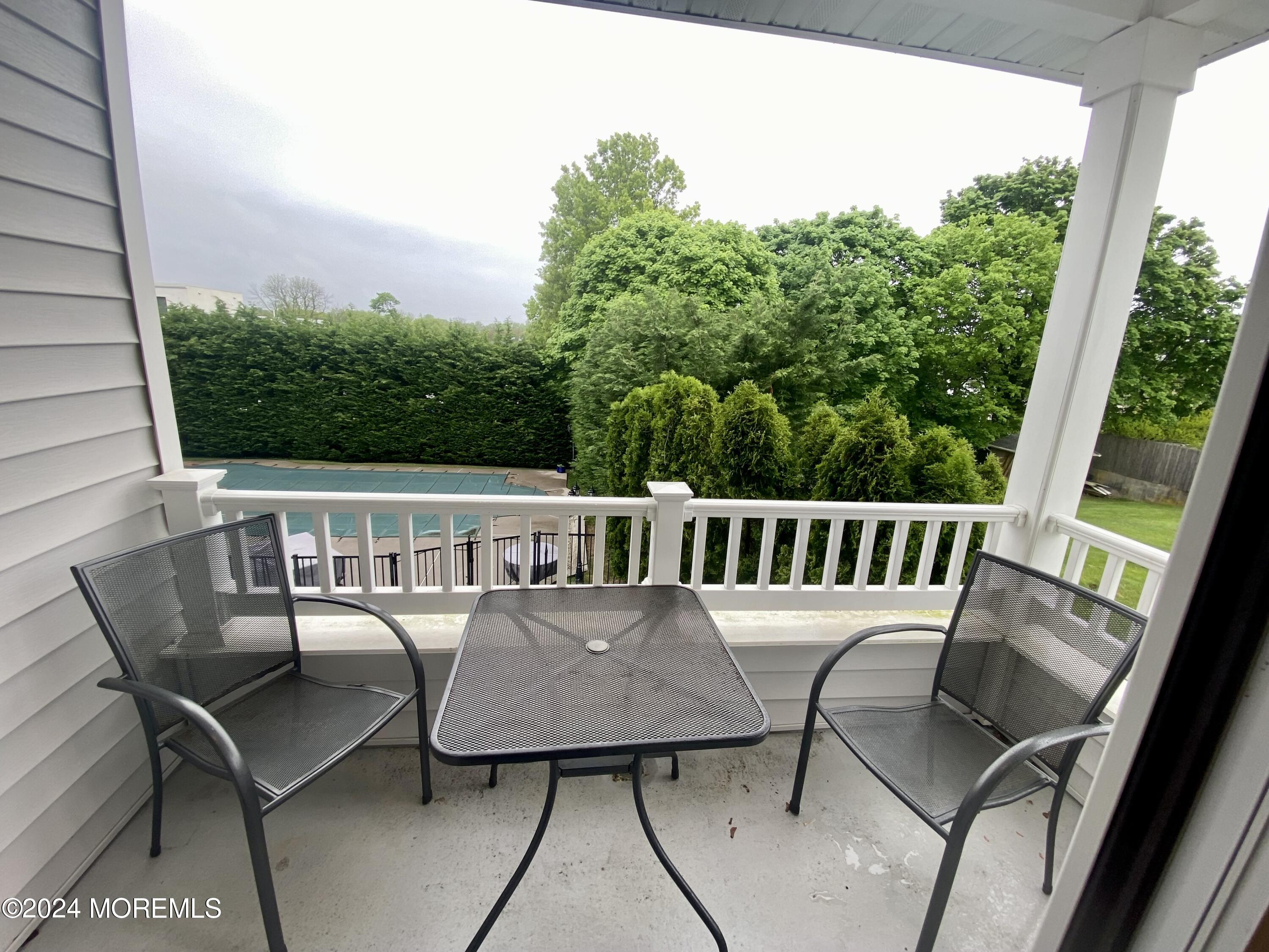 229 Lockwood Avenue Long Branch, NJ 07740 - Photo 10 of 24 a view of a chairs and table in the balcony