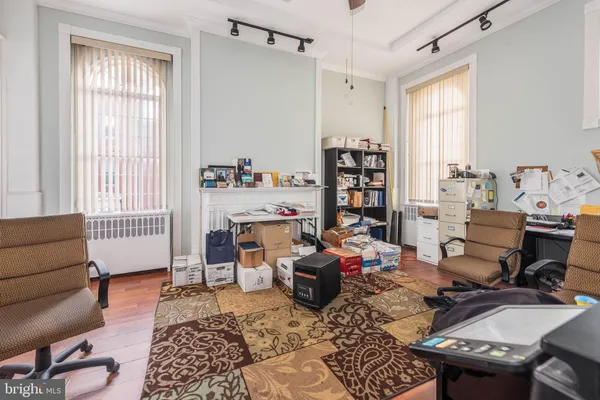 a kitchen with stainless steel appliances a stove a sink and a refrigerator