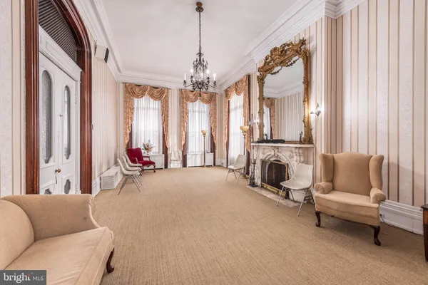a bedroom with a bed and a mirror