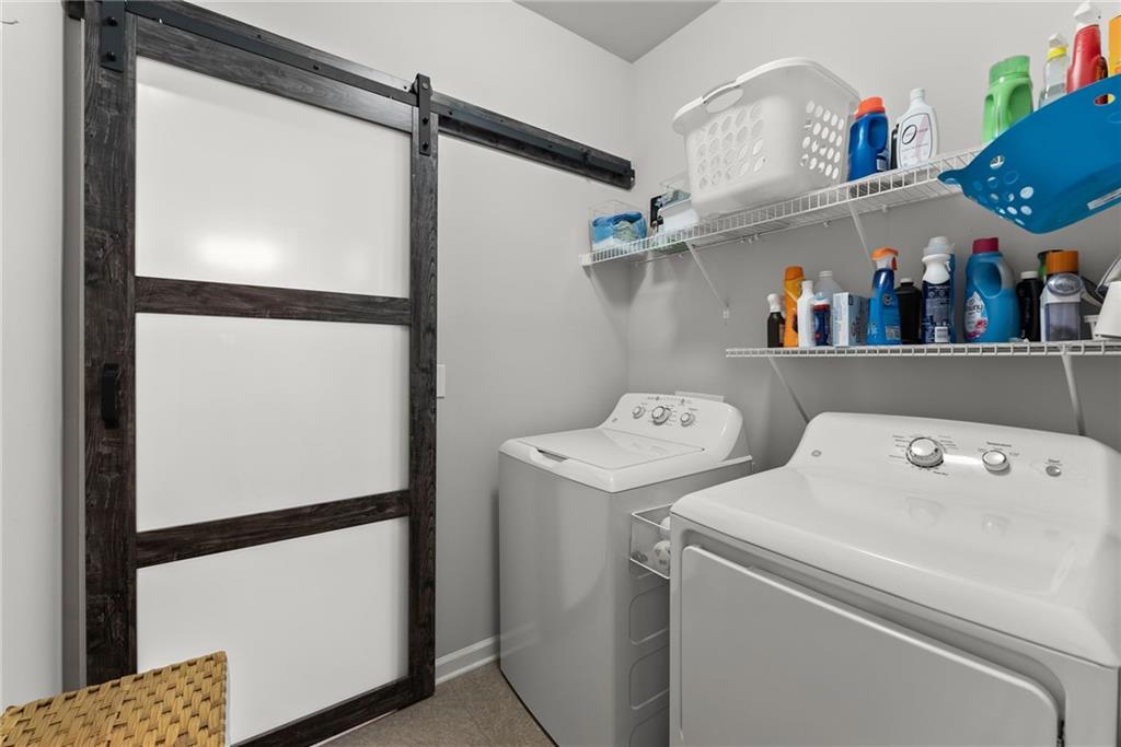 527 Gadwall Circle Jefferson, GA 30549 - Photo 23 of 48 a utility room with dryer and washer