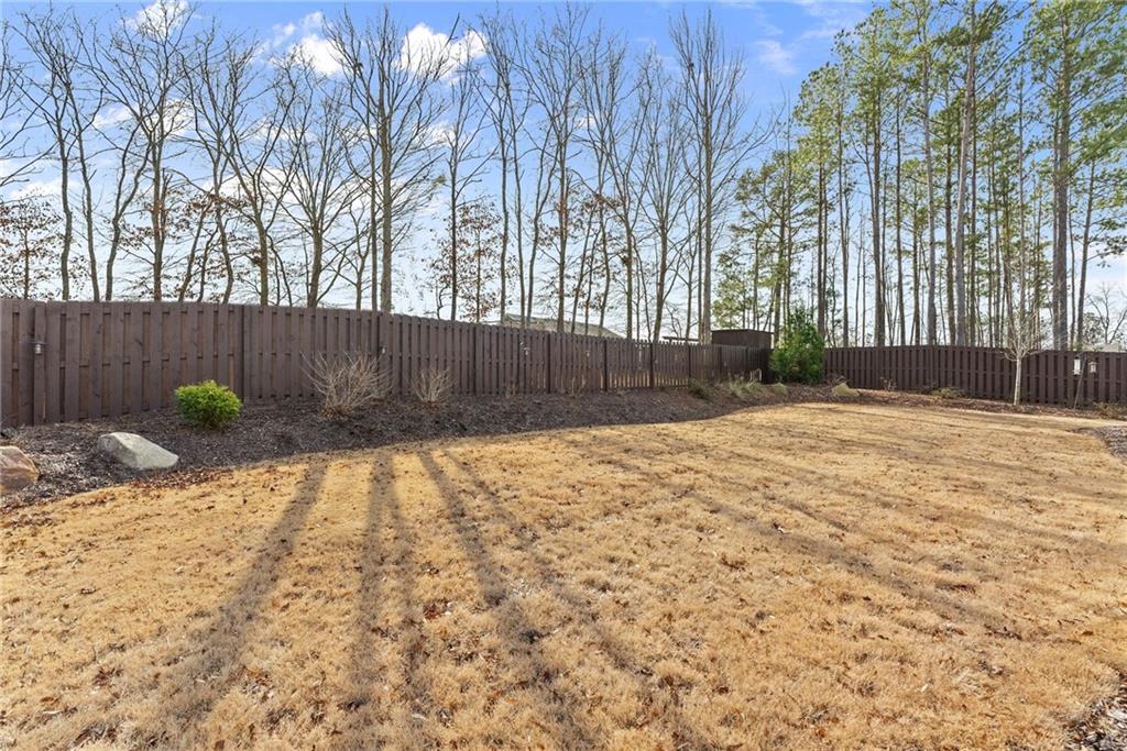 527 Gadwall Circle Jefferson, GA 30549 - Photo 44 of 48 a backyard of a house with lots of green space