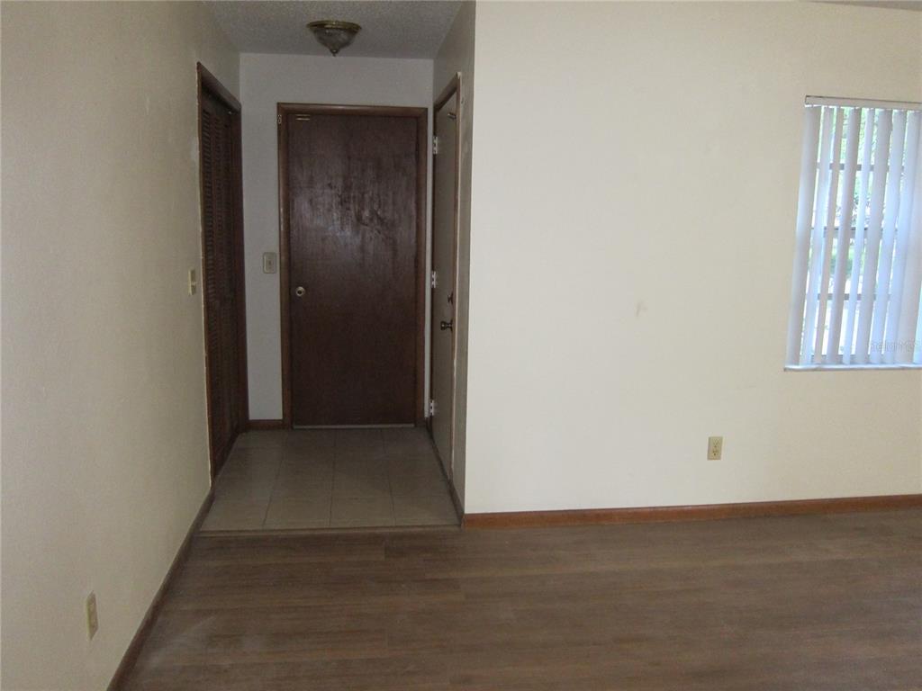 1209 Southwest 80th Drive Gainesville, FL 32607 - Photo 3 of 32 an empty room with windows