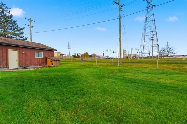 a view of a yard in front of a house with a yard