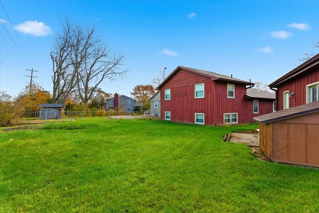 a view of a house with a big yard