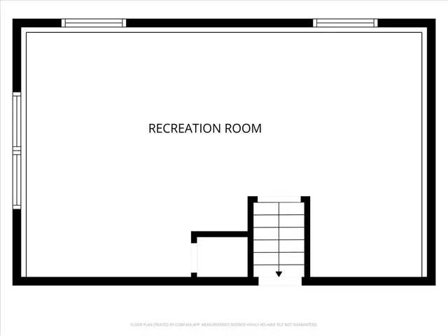 a backyard of a house with a garden and barbeque oven