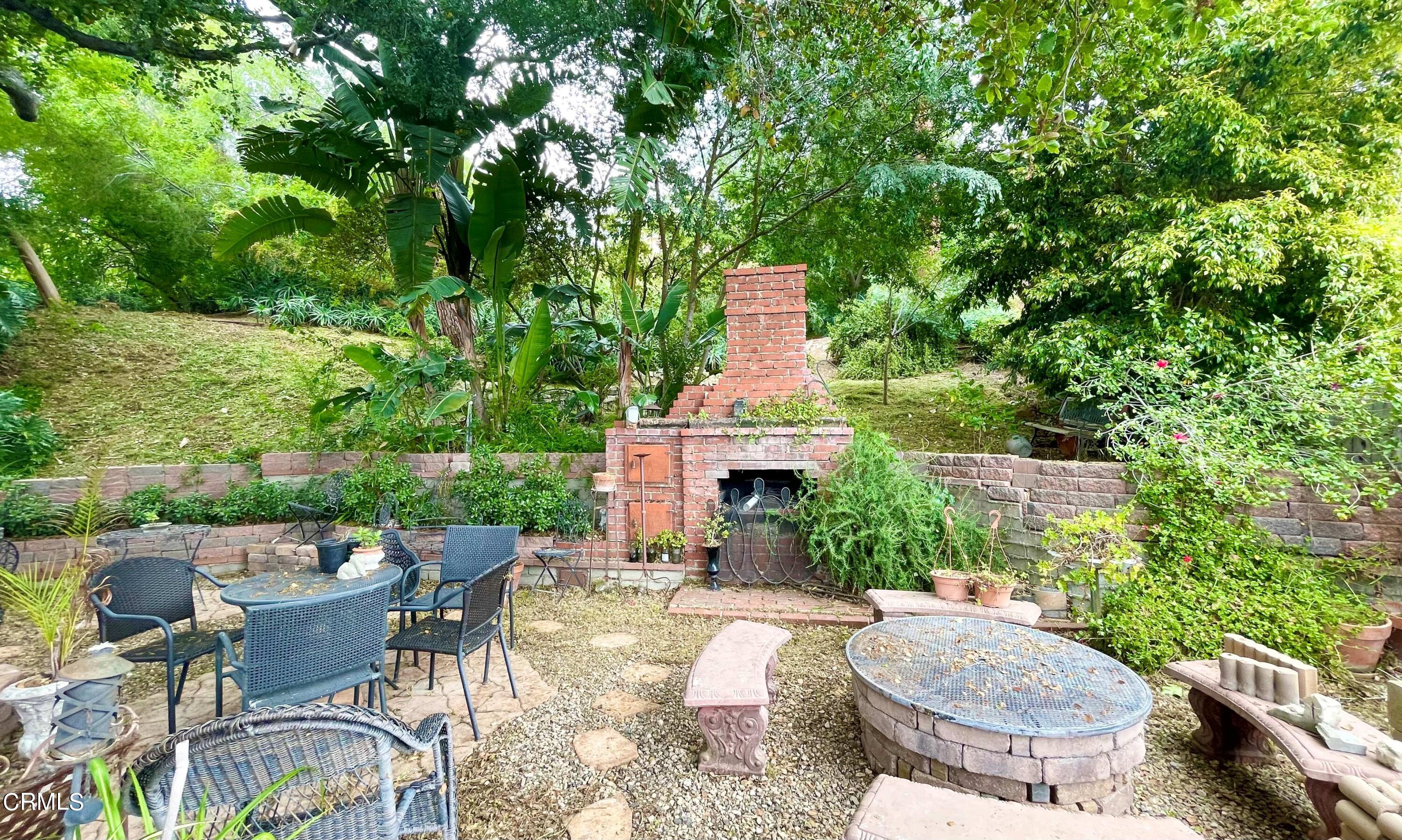 930 Sherlock Drive Burbank, CA 91501 - Photo 12 of 21 an outdoor space with furniture and garden
