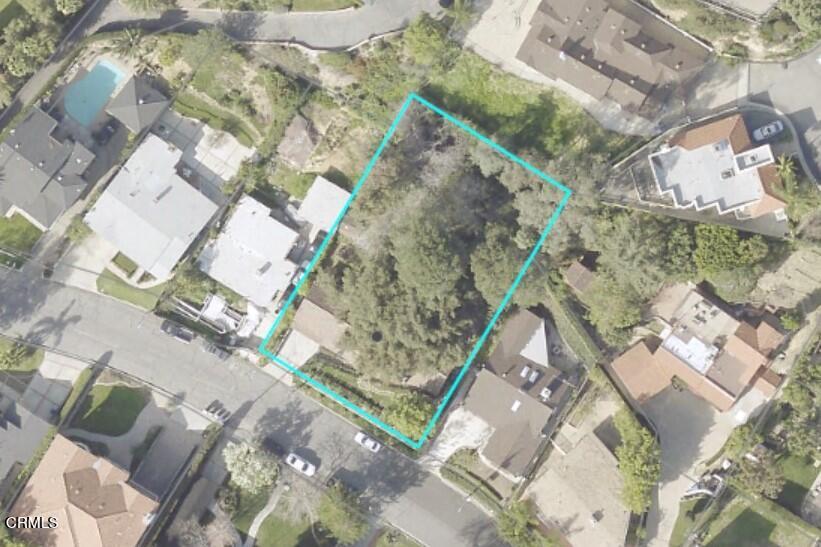 930 Sherlock Drive Burbank, CA 91501 - Photo 20 of 21 a bed with a white comforter and pillows