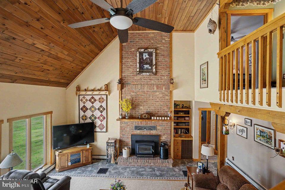 2270 Pine Tree Road Hughesville, PA 17737 - Photo 26 of 90 Cozy living space with rustic charm.