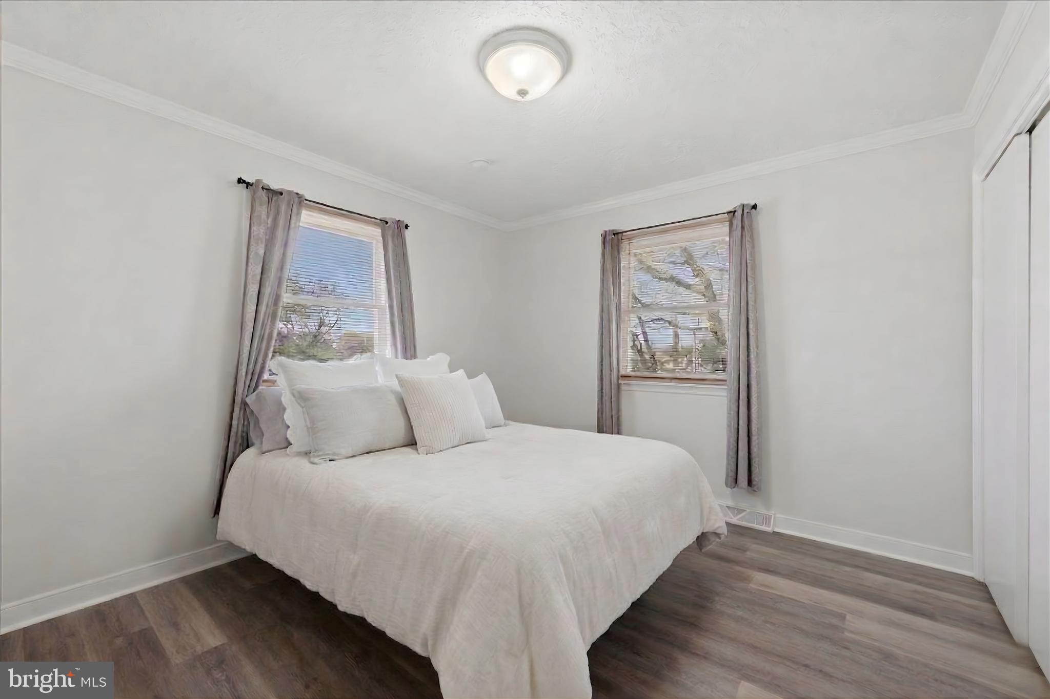 613 Overlook Street Culpeper, VA 22701 - Photo 6 of 15 a bedroom with a bed and night stand