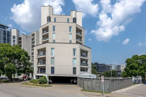 a front view of a building with balcony