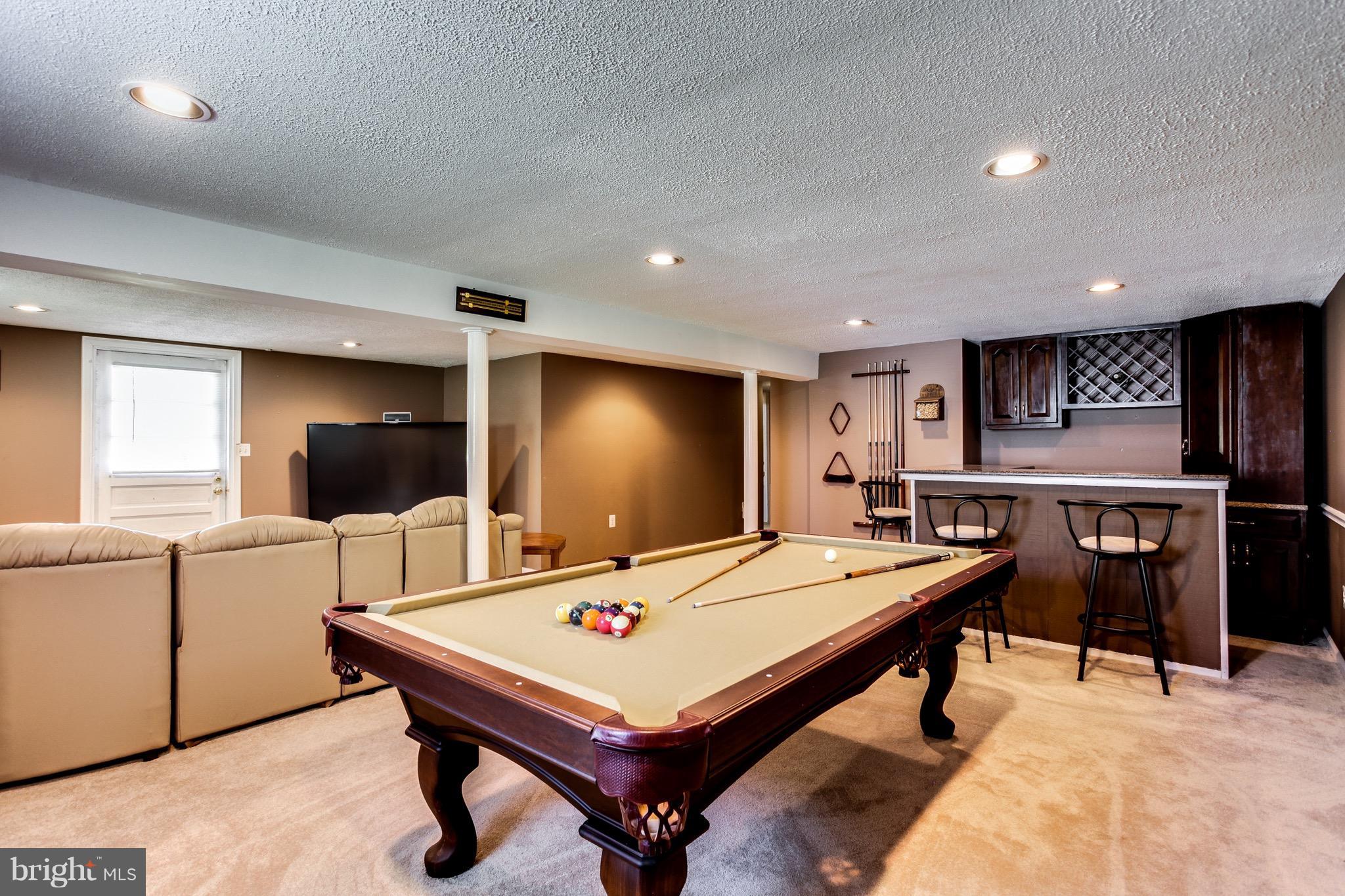 909 Mayo Road Edgewater, MD 21037 - Photo 16 of 29 Lower level game area & bar w/frig