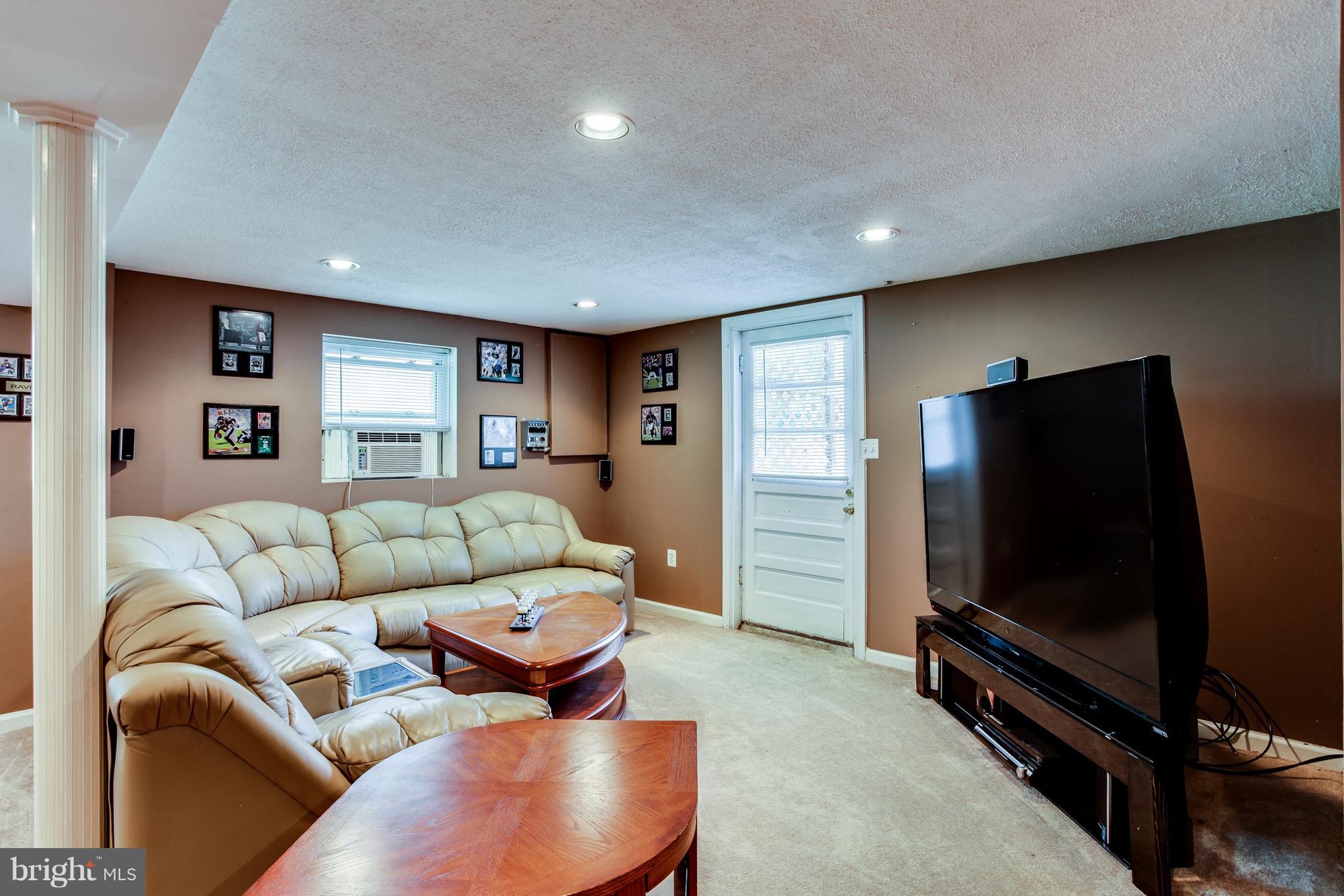 909 Mayo Road Edgewater, MD 21037 - Photo 17 of 29 Large recreation room in lower level