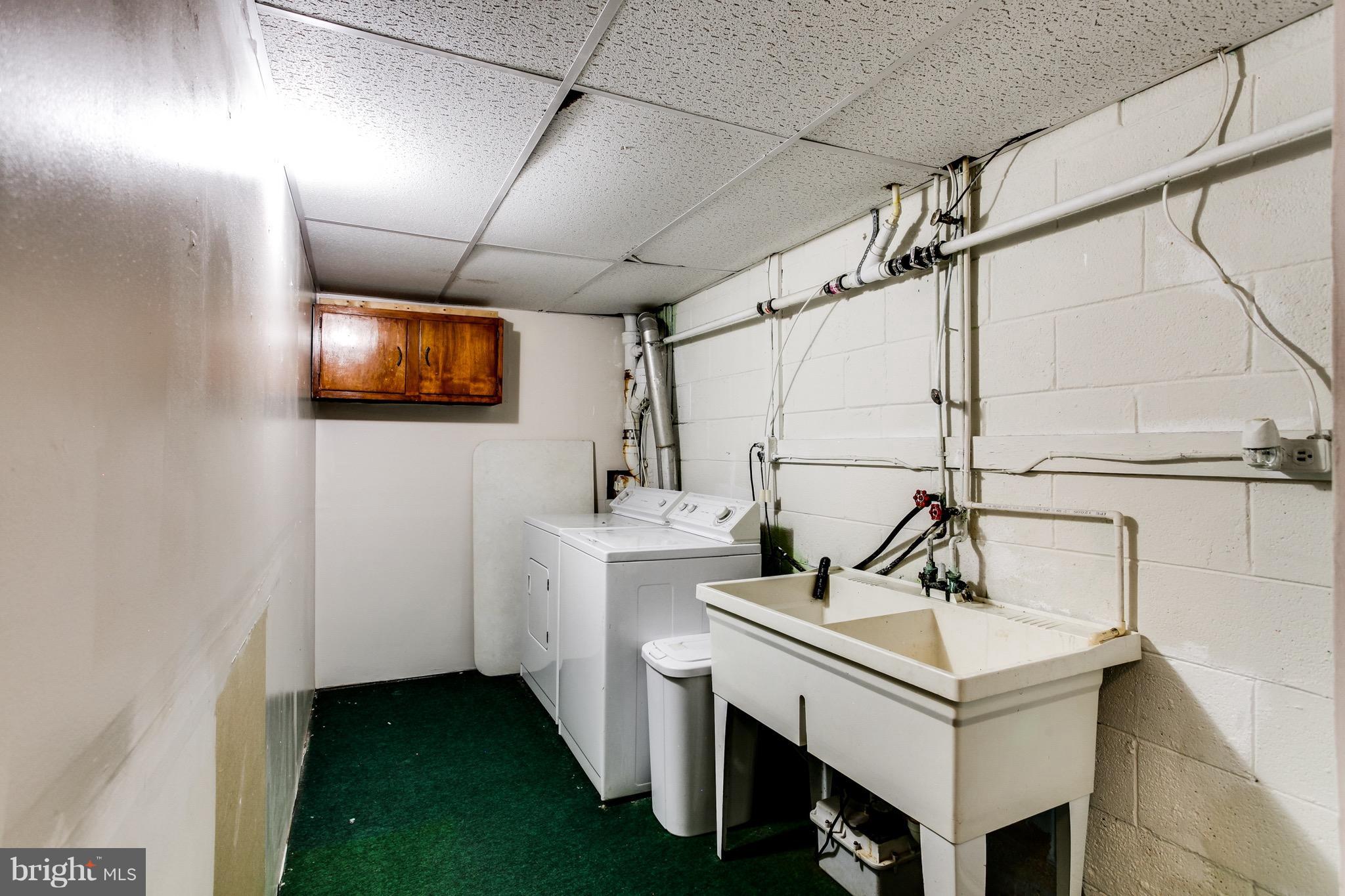909 Mayo Road Edgewater, MD 21037 - Photo 20 of 29 Spotless laundry room , units convey