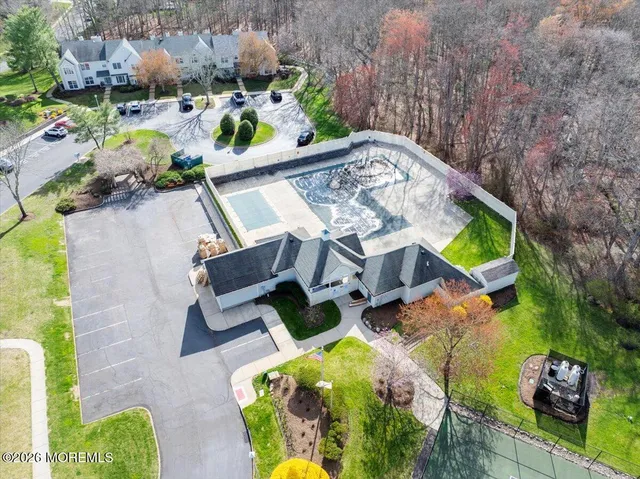 an aerial view of a house with outdoor space