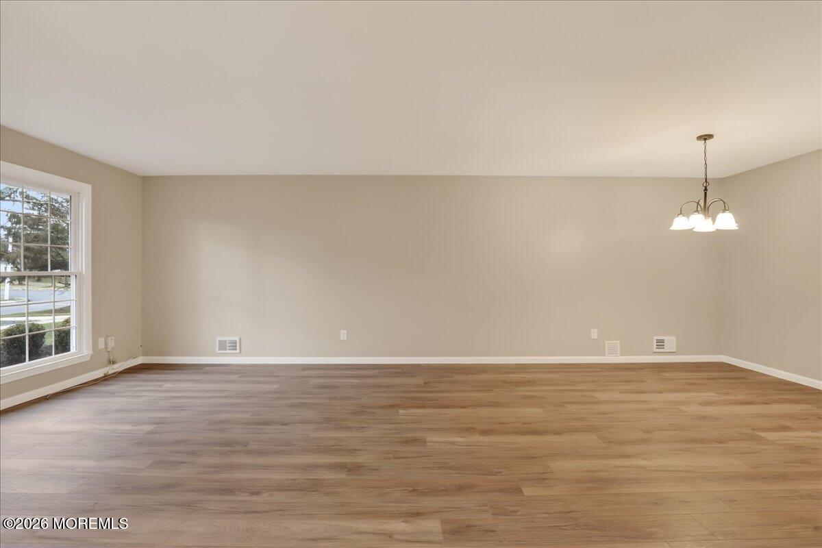 251 Sugar Maple Court, Unit 251 Howell, NJ 07731 - Photo 7 of 39 07-Living Room and Dining Room