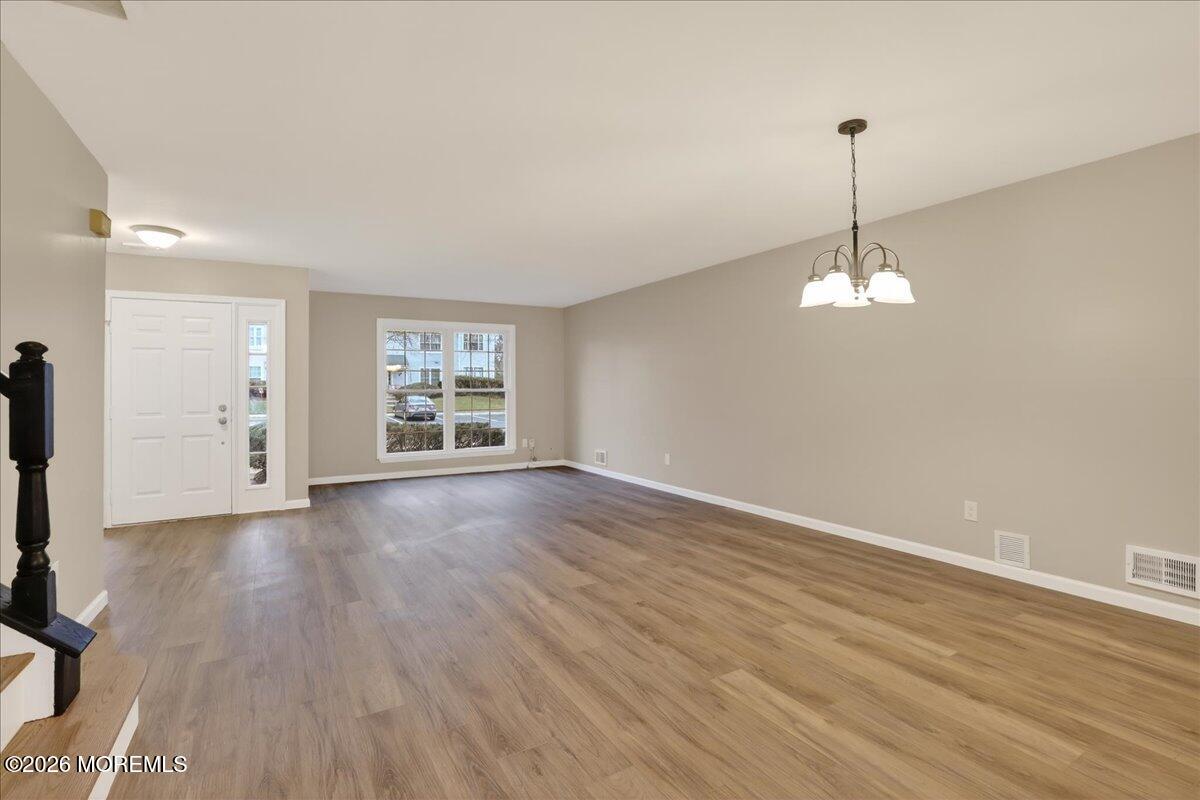 251 Sugar Maple Court, Unit 251 Howell, NJ 07731 - Photo 9 of 39 09-Dining Room and Living Room