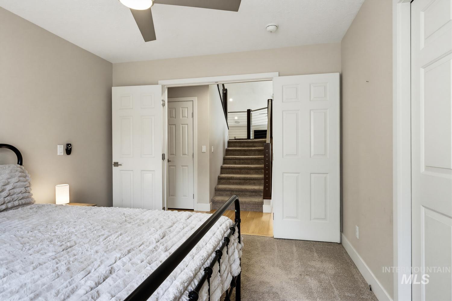 369 South Winthrop Way Boise, ID 83709 - Photo 23 of 50 Carpeted bedroom with a modern ceiling fan and recessed lighting