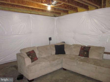 16501 Telescope Lane Dumfries, VA 22026 - Photo 26 of 30 a living room with furniture and a rug