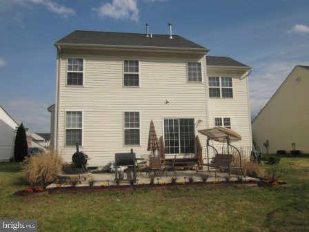 16501 Telescope Lane Dumfries, VA 22026 - Photo 27 of 30 a front view of a house with a yard