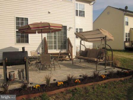 16501 Telescope Lane Dumfries, VA 22026 - Photo 28 of 30 a view of a house with backyard