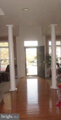 16501 Telescope Lane Dumfries, VA 22026 - Photo 5 of 30 a view of an empty room and wooden floor