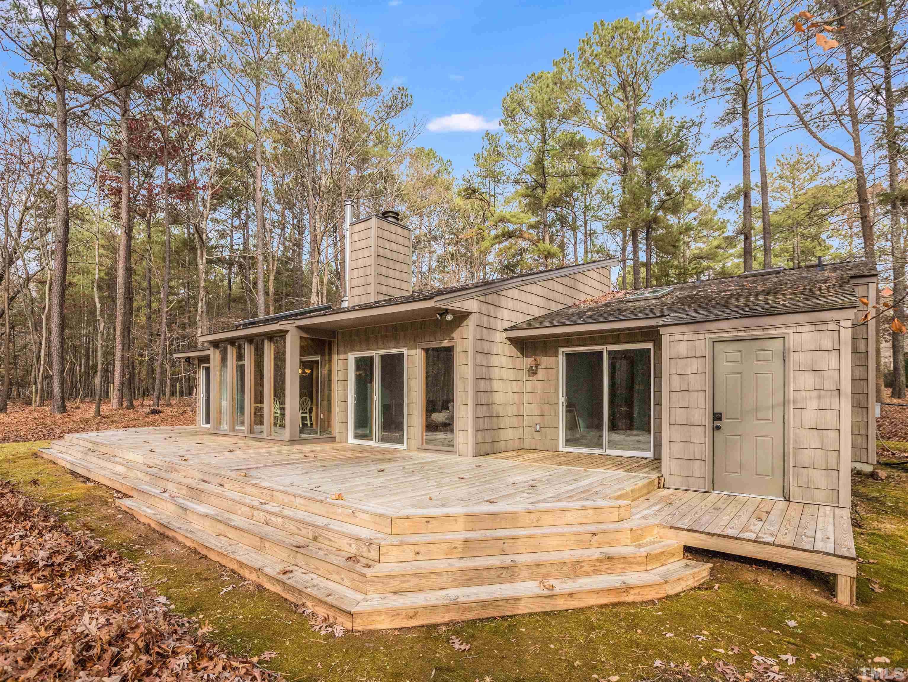 10401 Ray Road Raleigh, NC 27613 - Photo 22 of 24 a front view of a house with a yard