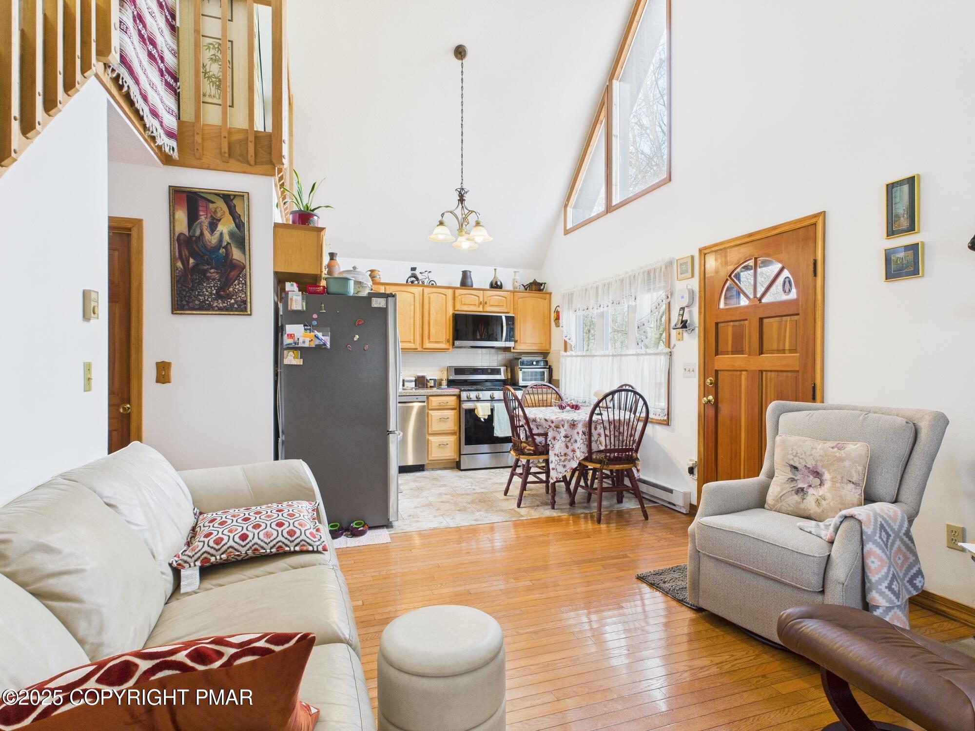 197 Hummingbird Trail Bushkill, PA 18324 - Photo 11 of 30 LIVING ROOM TO KITCHEN