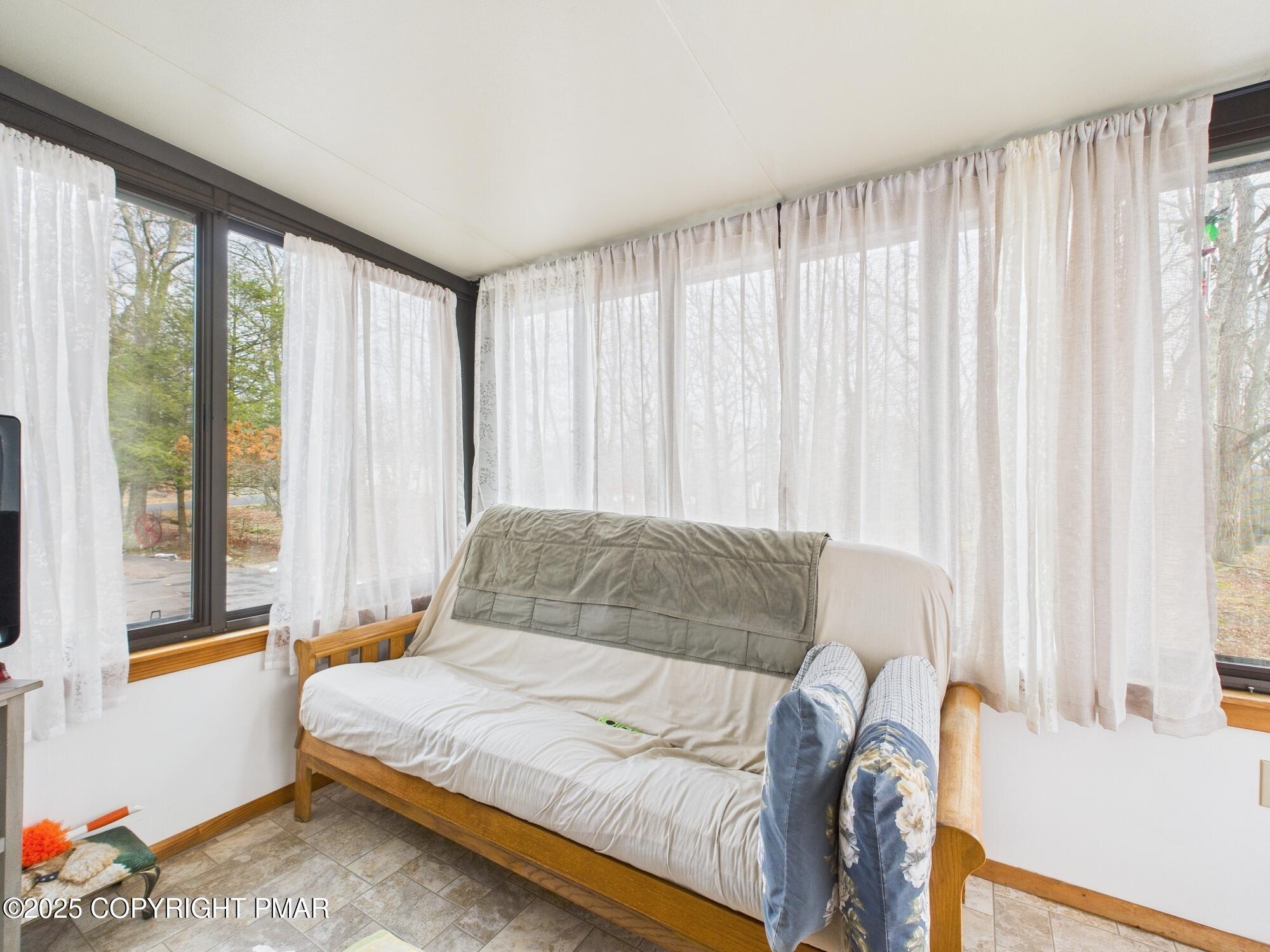 197 Hummingbird Trail Bushkill, PA 18324 - Photo 13 of 30 SUNROOM