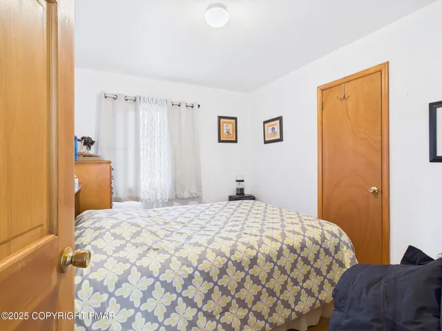 a room with furniture workspace and a window