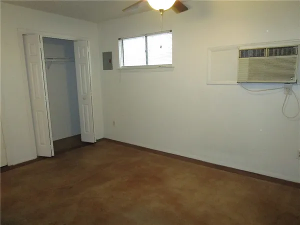 an empty room with windows