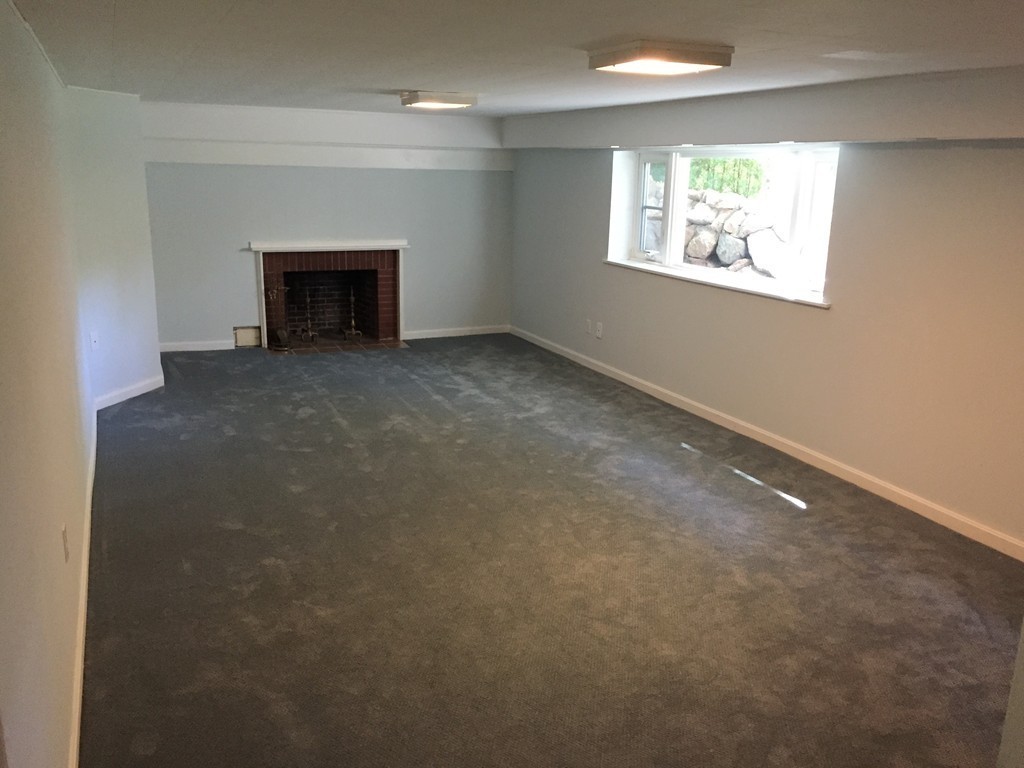18 Massasoit Road Wellesley, MA 02481 - Photo 10 of 13 an empty room with windows